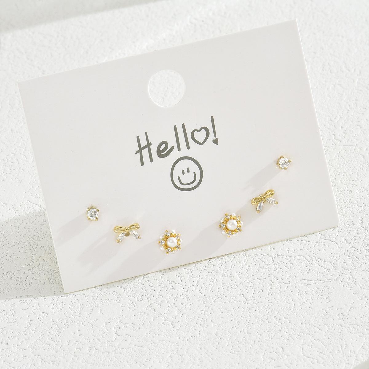 

Simple women s earrings Personalized bow inlaid zircon design stud earrings Light luxury high-end earrings