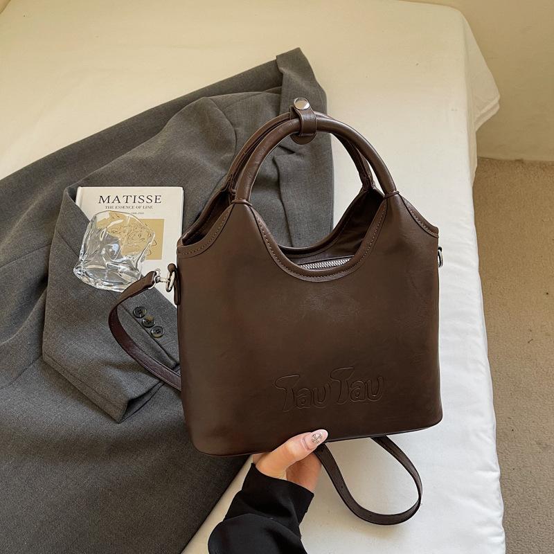 

2025 autumn new retro handbag women s fashion Korean version bucket bag simple high-value commuter women s messenger bag