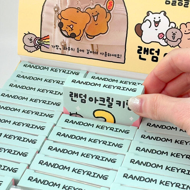 29 random acrylic keyrings in a box