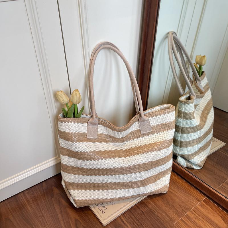 Large capacity fashion straw bag women's stripe contrasting color resort beach bag temperament commuter portable shoulder bag