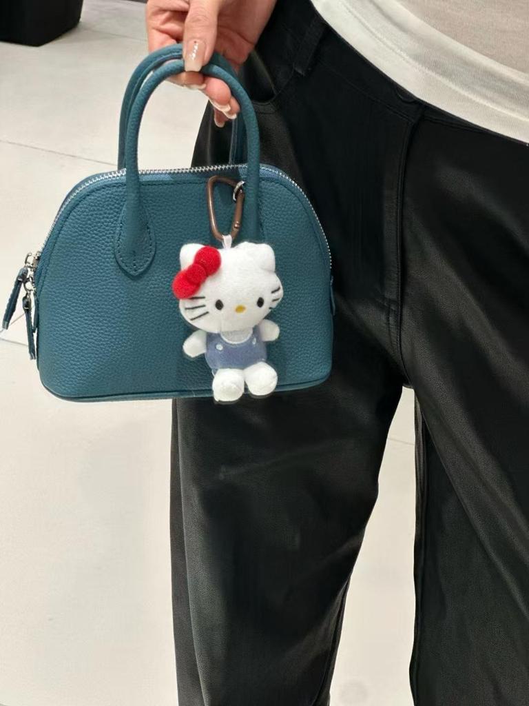 Trendige Mini-Umhängetasche aus echtem Leder im Bowling-Stil für Damen 2025