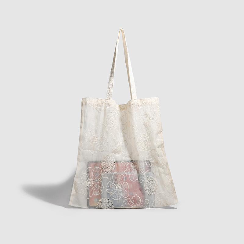 

Handmade literary and artistic Tencel hollow embroidery shoulder cloth bag female gentle romantic temperament female bag summer