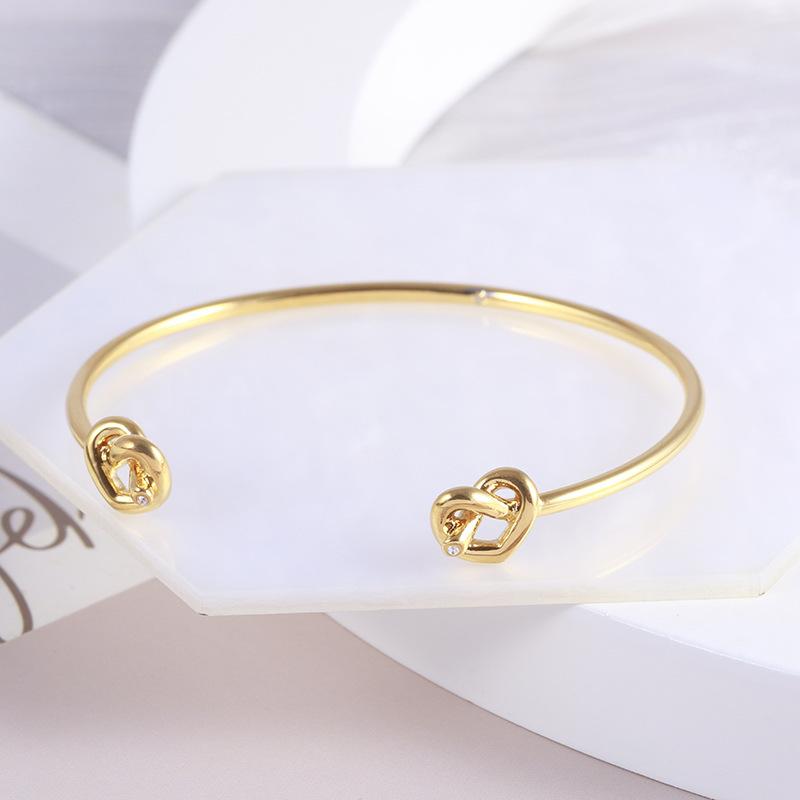 

European And American Accessories Wholesale Sweet Hollow Knot Love Opening Small Fashion Bracelet Bracelet