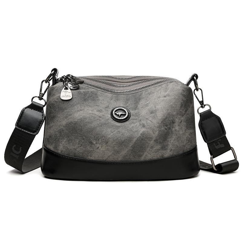 

Multi-layer women s shoulder bag simple and versatile texture messenger bag large-capacity splicing contrasting color casual bucket bag сірий колір