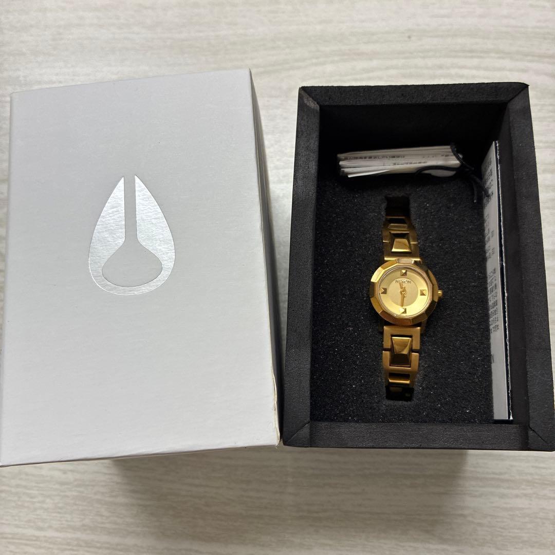 Used NIXON ladies watch gold color