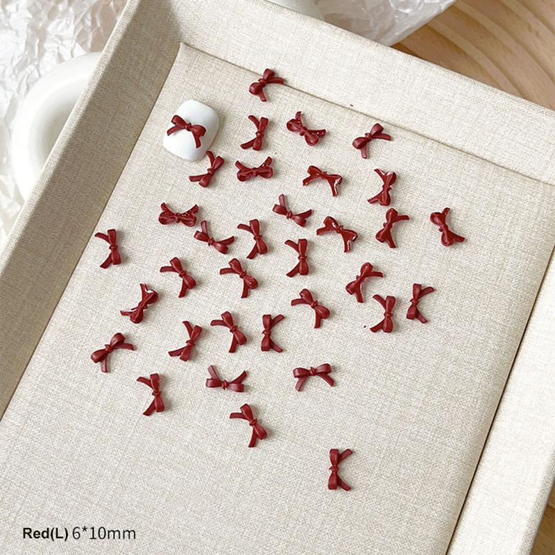 50Pcs Colorful Bow Nail Art Parts Charms Bulk Shiny Mini Resin Ribbon Nail Rhinestones Diy Summer Nail Art Decor Accessories