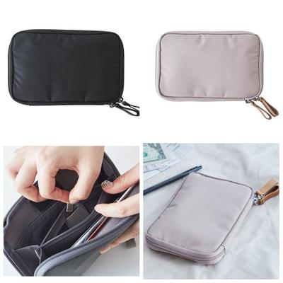 Portefeuille de voyage uni portable Rangement de billets Résistant à l'eau Porte-passeport Nylon coréen Pack de voyage multifonction Voyage