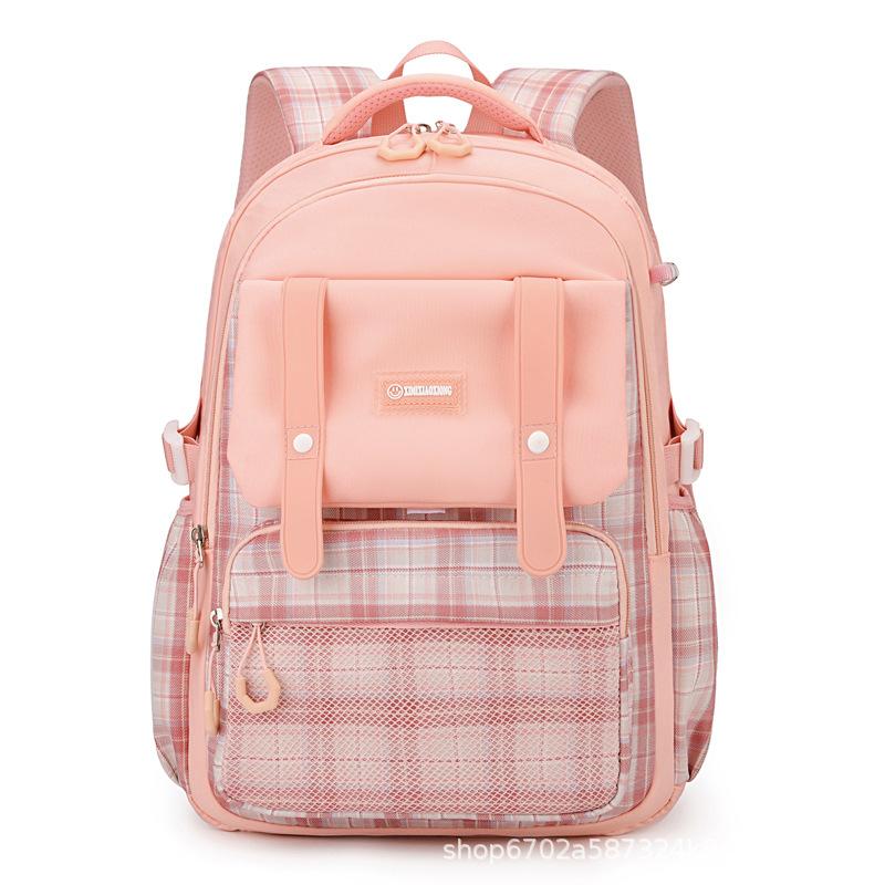 New schoolbag for primary school students, plaid load-reducing ridge backpack, anti-splashing water and wear-resistant canvas backpack, fashionable.