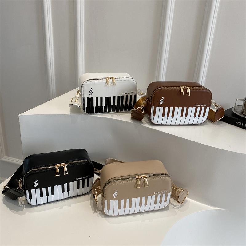 2025 nowa torba na pianino modna kontrastowa mała kwadratowa torebka damska słodka nuta muzyczna mała listonoszka przenośna torba damska