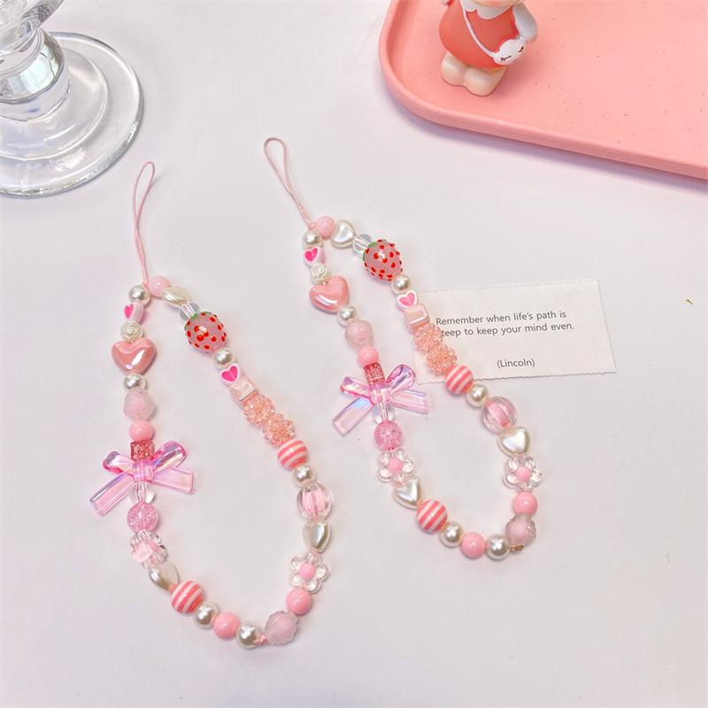 Süße und niedliche rosa Erdbeere Handy-Anhänger Handyketten für Damen Perlenkette Handy-Anhänger Charme Schlüsselband gegen Verlust Schmuck