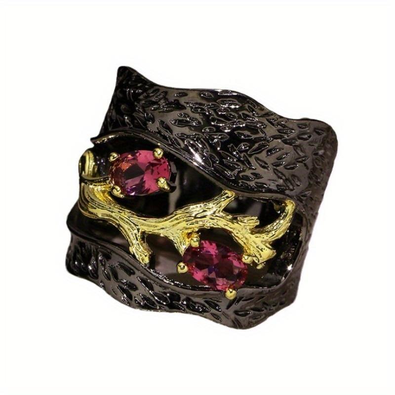 Black and gold branch ring with inlaid accents. Unique art style for Halloween and Christmas—mysterious and fantastical.