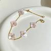 Elegantes Rosa Perlmutt Vierblättriges Kleeblatt Verstellbares Armband - Leichter Luxus Frühling/Sommer Schmuck für Damen