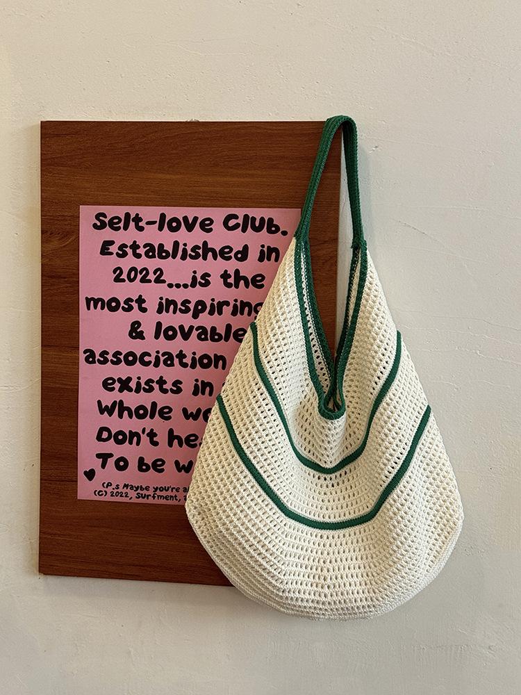 

Korean large-capacity hollow knitted bag 2025 new seaside vacation woven bag niche commuter versatile shoulder bag