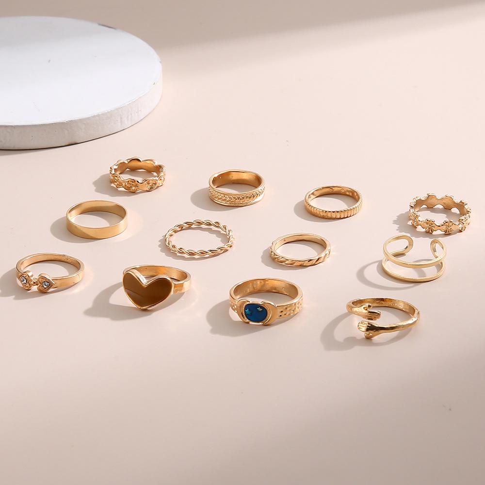 Fashionable Heart-Shaped Rings Set: Twisted Design with Micro-Inlaid Diamonds, 12 Pieces