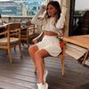 RUGOD New Women's Fashion Long Sleeve Corset Pleated Mini Skirt Short Skirt Women's Knitted Sweater Two Piece Set