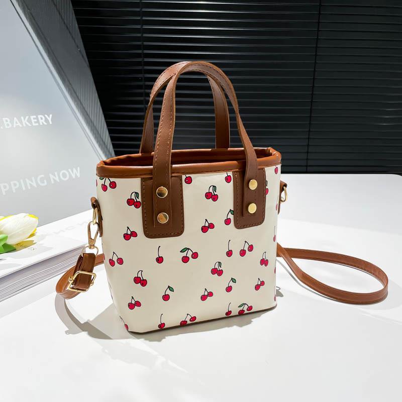 

Женская большая вместительная симпатичная сумка-ведро через плечо для поездок на работу - вишневый принт, модная сумка для повседневного офиса, новое поступление коричневый