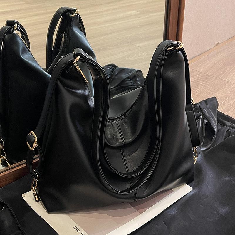 

Женская сумка-тоут 2024 новая большая вместительная сумка-рюкзак для поездок на работу, ретро-универсальная сумка через плечо премиального качества, рюкзак для выхода в свет чёрный