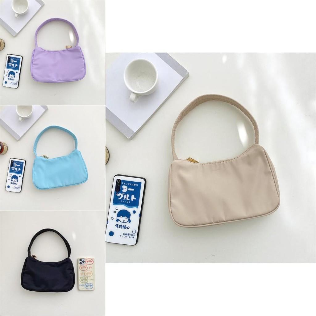 Trendy Urban Minimalist Small Nylon Handheld Bag For Women Available In Elegant Shades