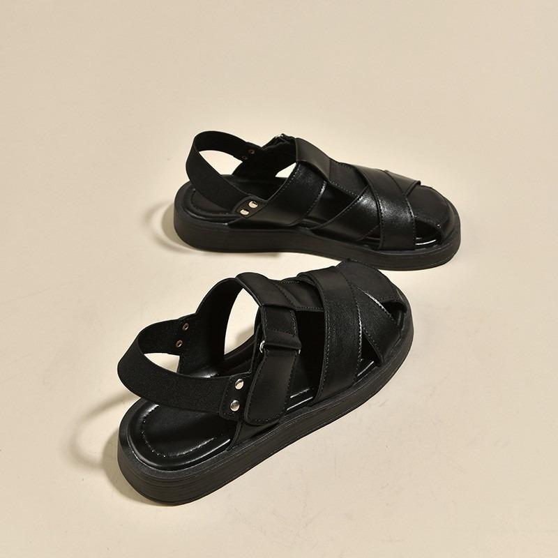 Baotou woven sandals women's new trendy flat bottom versatile hollow pig cage shoes women