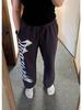 Herre Joggebukser med brede ben og stor skrift: Trendy fritids-, trenings- og joggebukser