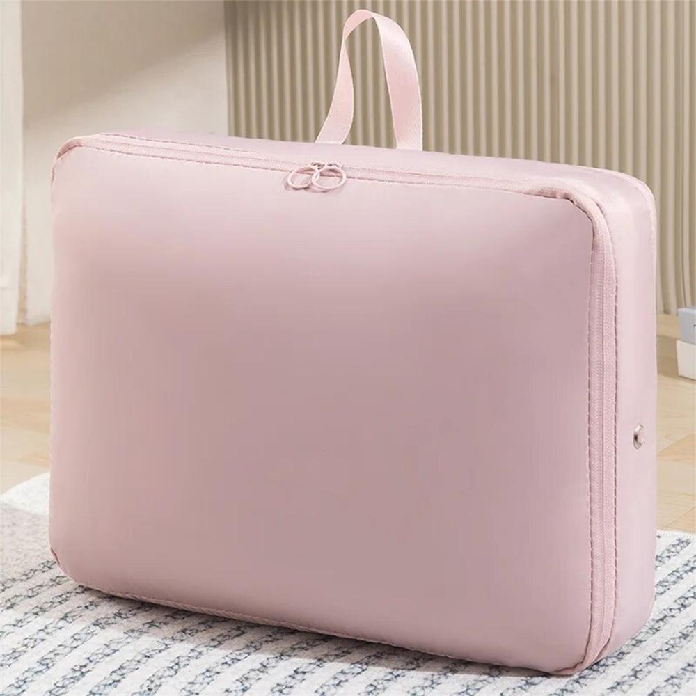 

Autumn And Winter Compression Clothes Packing Bag Space Saving Quilts Bag Wardrobe Storage Luggage Down Jacket Cotton Organizer 40X18X30cm рожевий