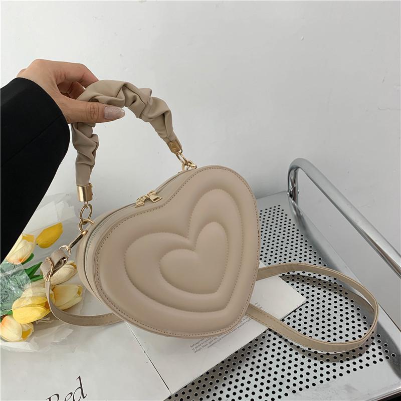 Adorable 2024 Heart Shaped Imprint Handbag For Girls Casual Fashionable Small Bag