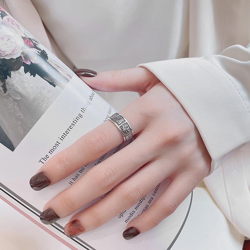 Retro Mantra Ring: Adjustable, Versatile Index Finger Ring In Imitation Thai Silver.
