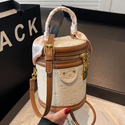 High-quality New Products Cute Embossed Light Luxury High-end Portable Cylinder Bag Niche Design Versatile Temperament Messenger Women's Bag