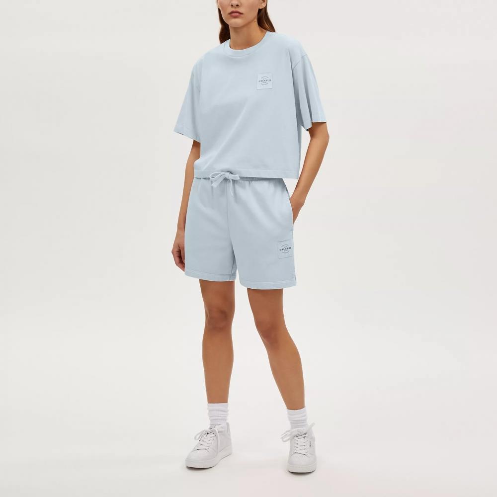 Coach Garment Dye Track Shorts Cream