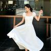 Sexy waist and thin long dress, new summer white pleated bubble sleeve backless dress is popular.