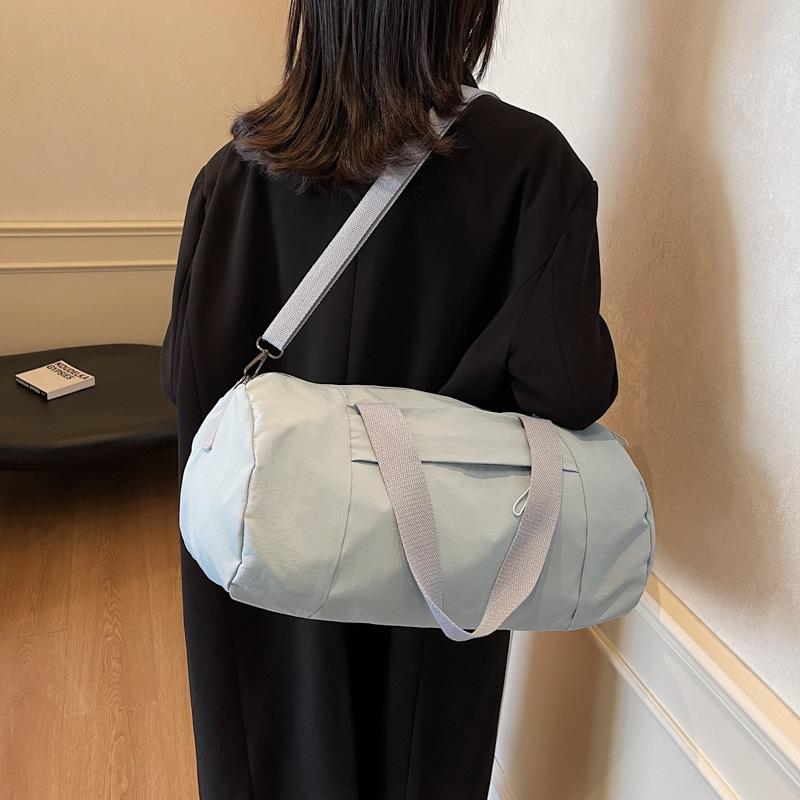 2025 New Japanese Women's Sports Yoga Bag Casual and Lightweight Shoulder Portable Messenger Bag Cylinder Bag Large Capacity