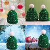 Entzückende grüne Weihnachtsbaum-Mütze für Kinder Bequemes handgemachtes Geschenk für die Feiertage