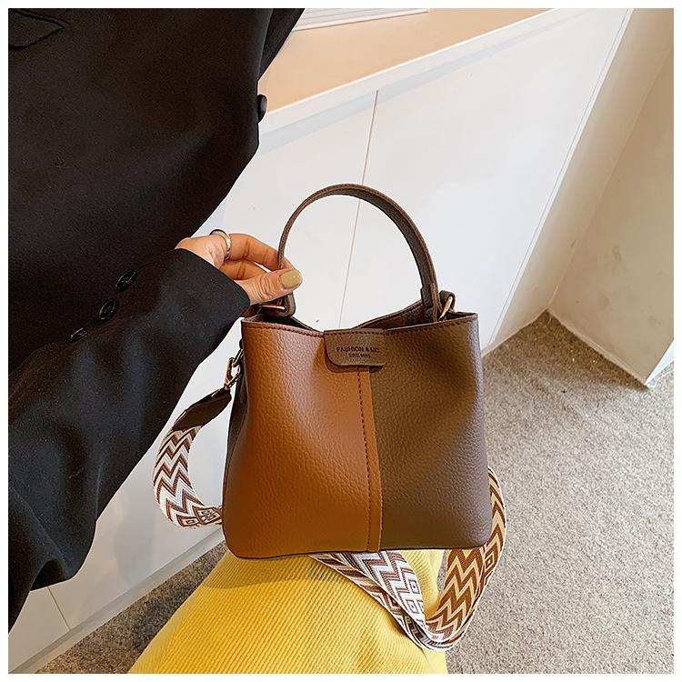 This year's popular retro niche color scheme portable bucket bag women 2025 new commuter shoulder messenger bag