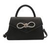 Simple and popular versatile solid color bow sewing line women's bag fashionable oblique span shoulder handbag