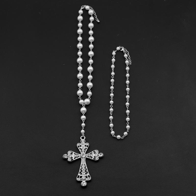 Meier Cyberpunk cross necklace - dark, statement piece with micro-paved pearls, perfect for layering