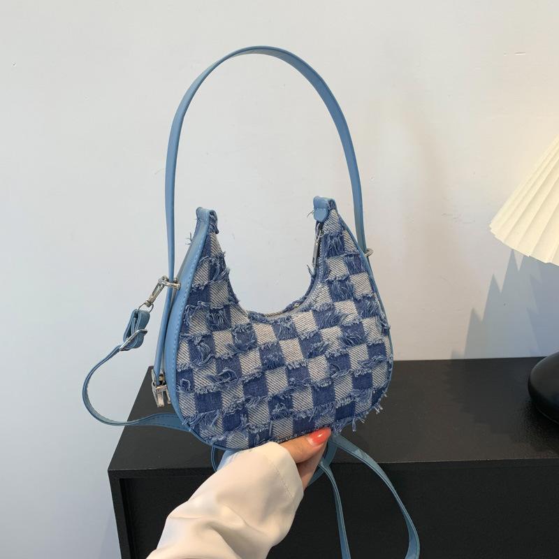 

Джинсовая модная сумочка 2025 лето новая в иностранном стиле на плечо сумка-мессенджер сумка-пельмень корейская версия женская маленькая сумка светло-синий