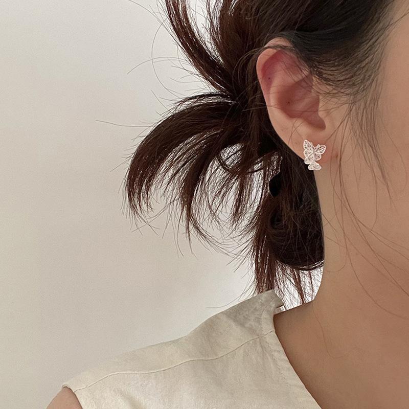 Matte hollow butterfly stud earrings simple and versatile high-end earrings women's fashion small temperament earrings