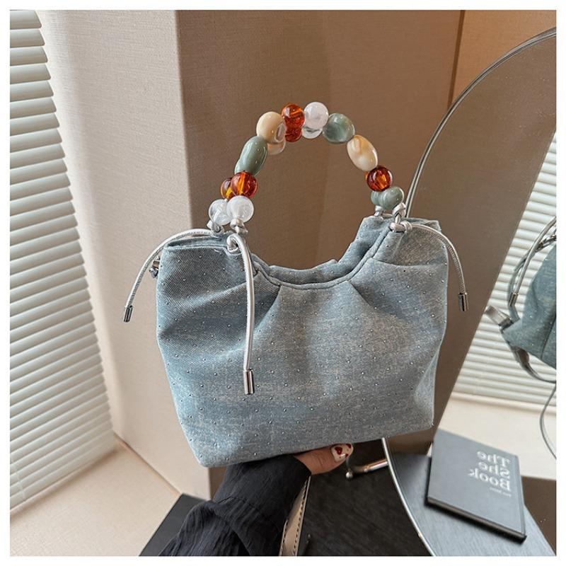 Pleated high-end fashion versatile new bucket bag women's solid color cute niche design messenger bag