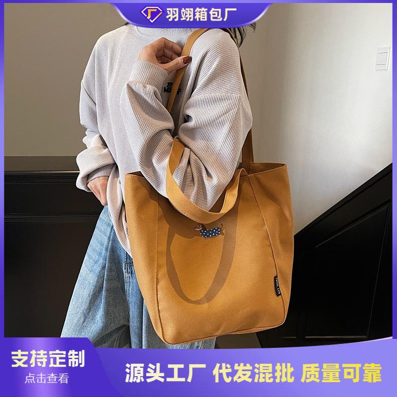 Canvas bag women's large-capacity new literary and artistic shoulder bag college students commuting tote bag