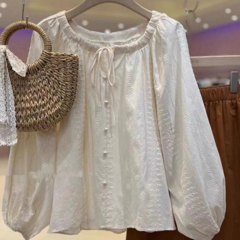 

Жіночий французький ретро топ з вишивкою та рукавами-ліхтариками - Осінь 2025 Medium абрикосовий