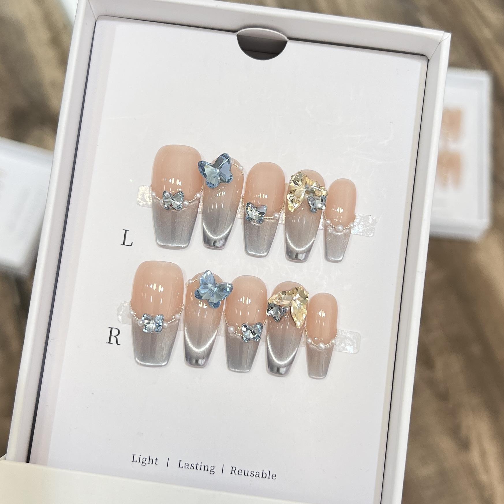 

Плетёная вручную броня Высококлассный кошачий глаз Улыбка Французский синий перо Супер вспышка Алмазы Дунчжоу Накладные ногти Съемные Large L