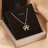 Goldene Schleife Anhänger Halskette für Damen - 18 Karat Gold Mattierte Schlüsselbein Kette Geschenk