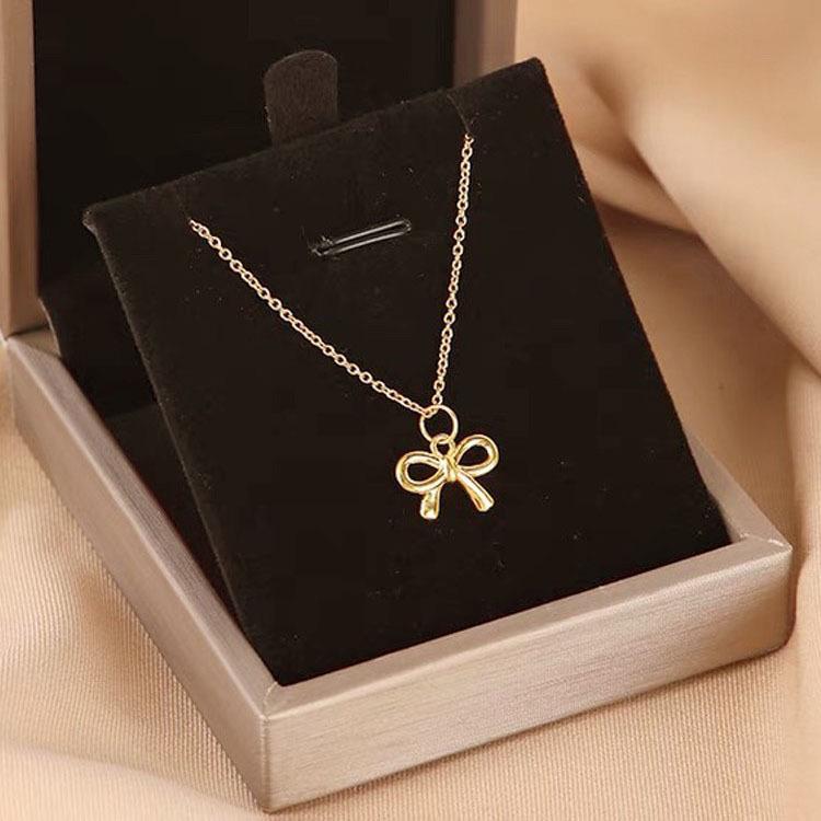Goldene Schleife Anhänger Halskette für Damen - 18 Karat Gold Mattierte Schlüsselbein Kette Geschenk
