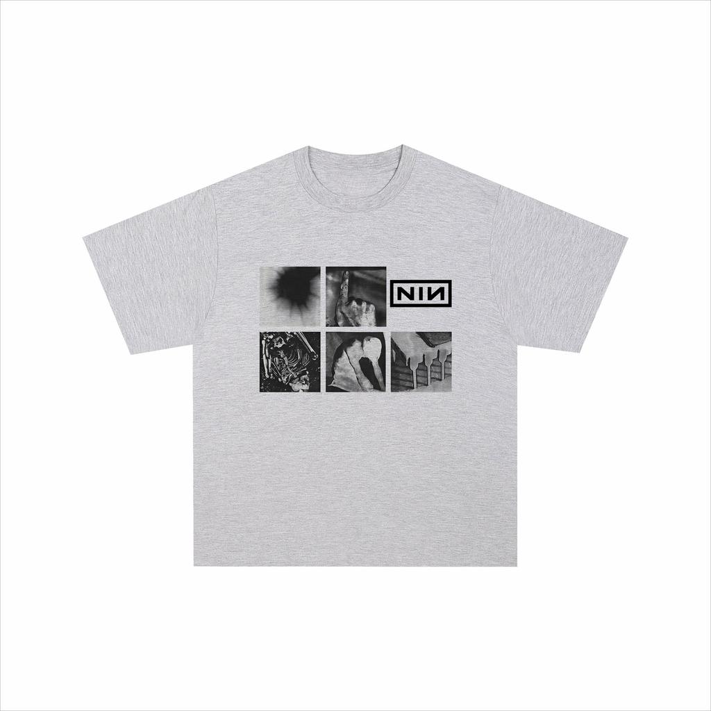 T-shirt a maniche corte pesante in metallo stampato band rock Nine Inch Nails con uno stile vintage ampio