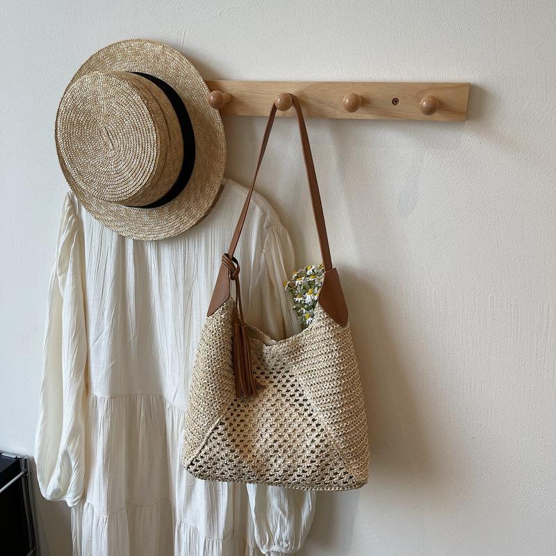 

2025 new ins paper rope pendant woven bag fashion hollow casual straw bag beach bag shoulder women s bag