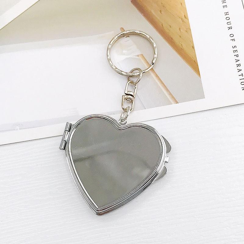 

Модный двусторонний кулон-зеркальце в форме сердца для женщин и девушек, креативный, для личности, складное мини-косметическое зеркальце с двух сторон, подарки