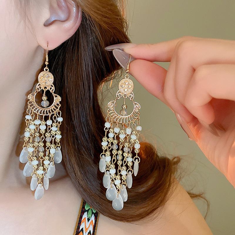 Bohemian ethnic style fringed earrings long niche woven feather earrings new travel wear earrings women