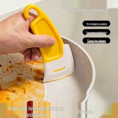 Grattoir en Silicone Ménager pour Nettoyer Casseroles, Poêles et Plaques de Cuisson - Élimine les Taches d'Huile et de Graisse Sans Effort.