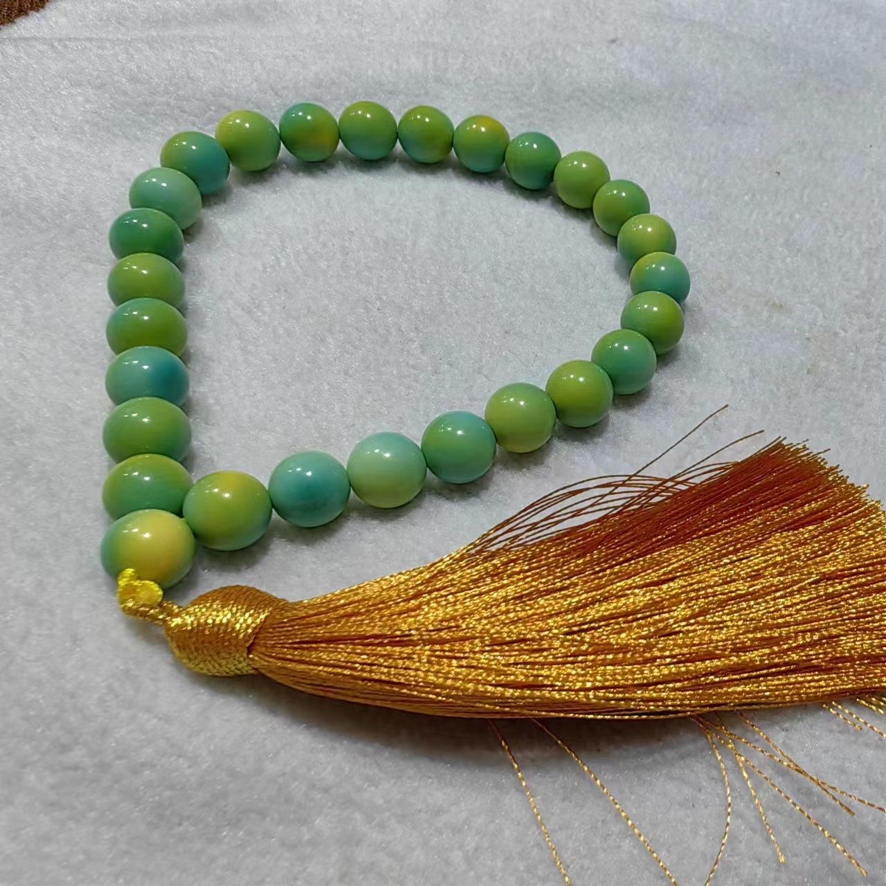 

Premium Magnesite Turquoise Bracelet - Gradient Old-Style Round Beads, High-Quality Imitation Wenwan Design. 9mm