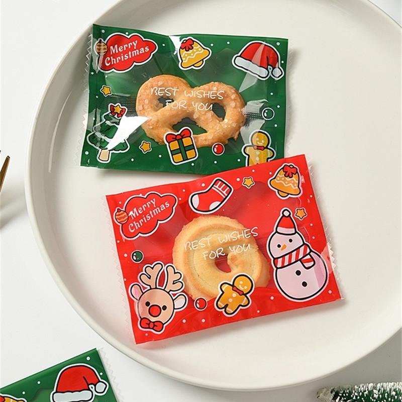 100Pcs 7x10cm Plastic Christmas Machine Sealed Bags Snowflake Pastry Candy Cookie Xmas Party Gift Packaging Supplies